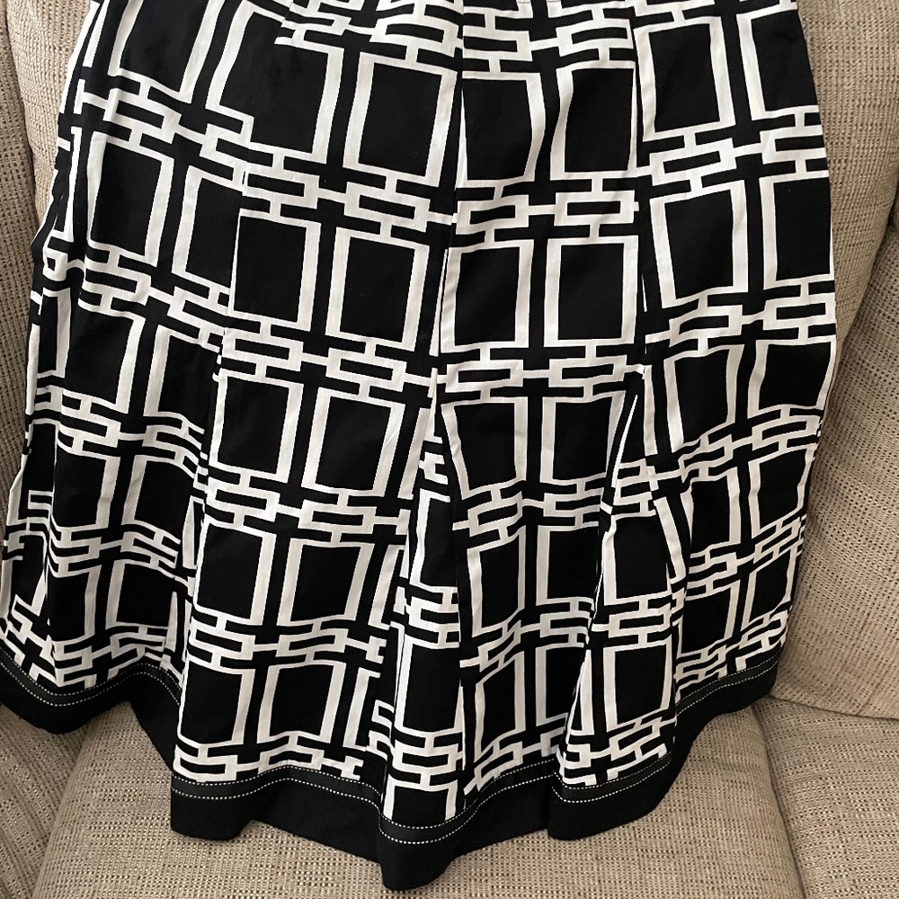 Cute & classy black and white SKIRT , size